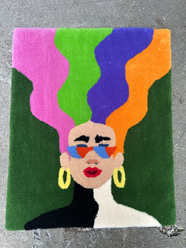 Girl with sunglasses and colorful hair on a rug